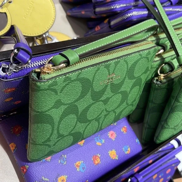 Coach Corner Zip Wristlet In Signature Canvas 
Im/Neon Green - Picture 2 of 16